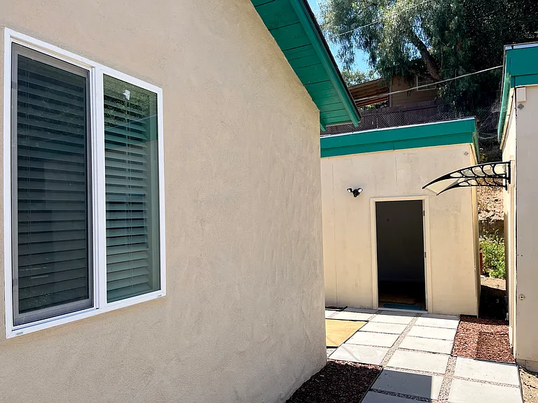 Path leading to 2 detached storage/craft rooms.
Approximately 150 square feet each.