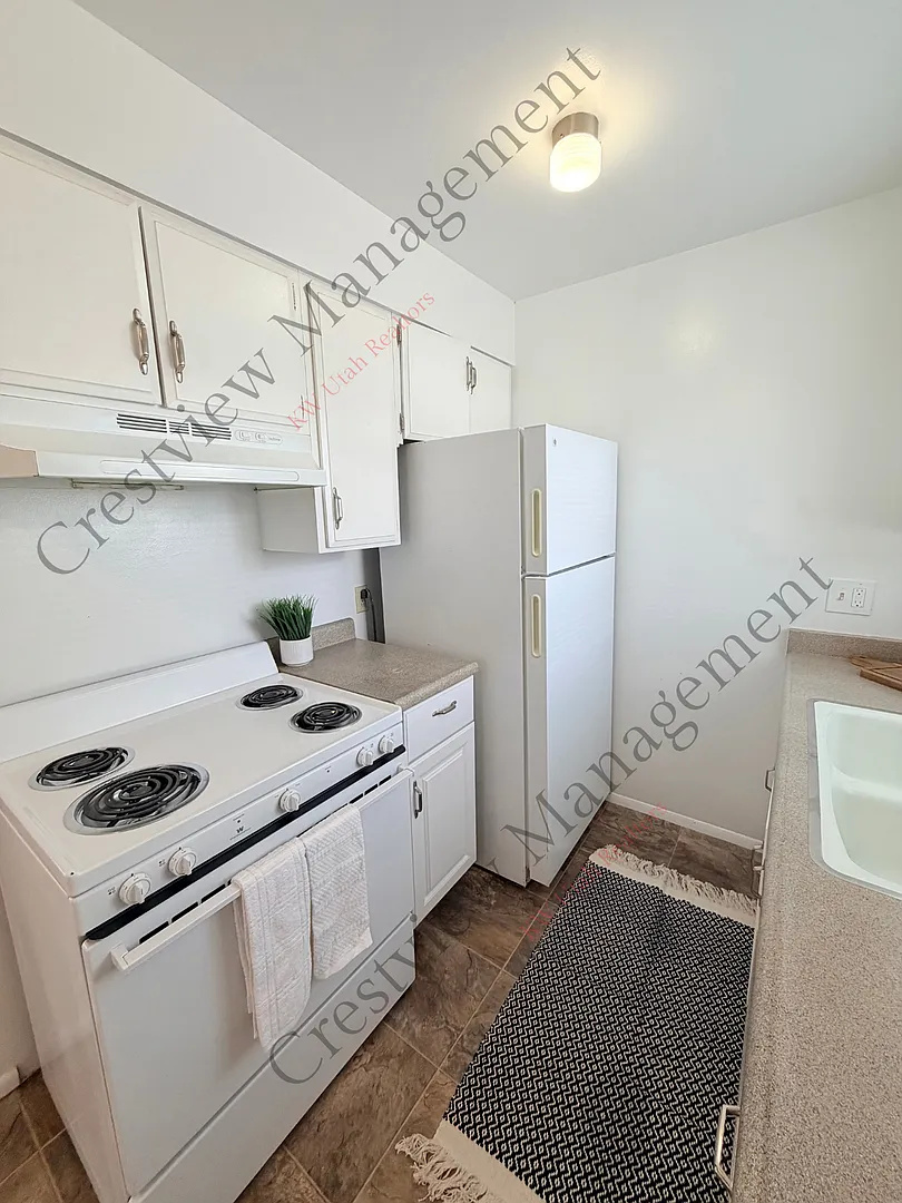 Spacious 2-Bedroom Basement Apartment with Covered Parking! - $500 Off Total Move-In Costs! — Photo 1
