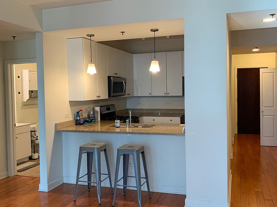 entrance, kitchen and full bathroom