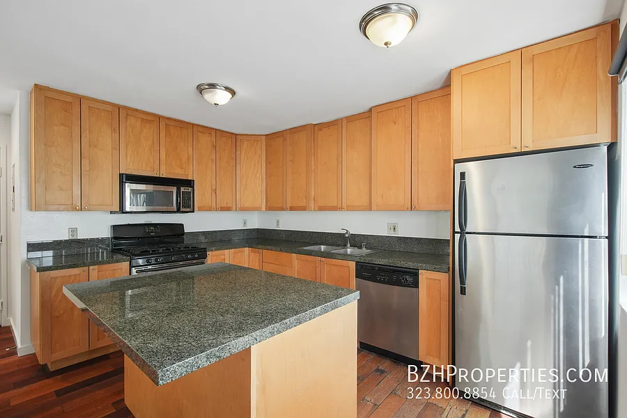 Bright Two-Story Townhome with Fireplace, Balcony & 2-Car Garage Parking — Photo 3
