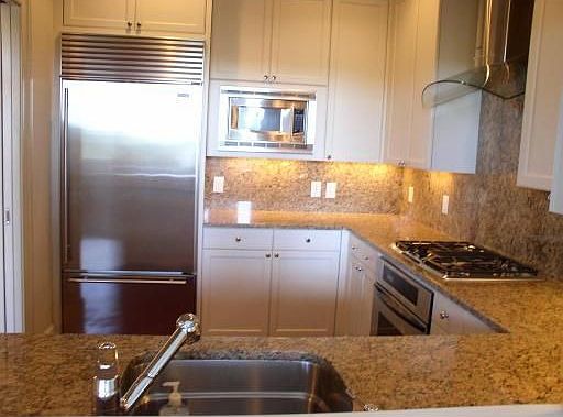 Kitchen: Stainless appliances (Sub-Zero, Thermador, Franke)
