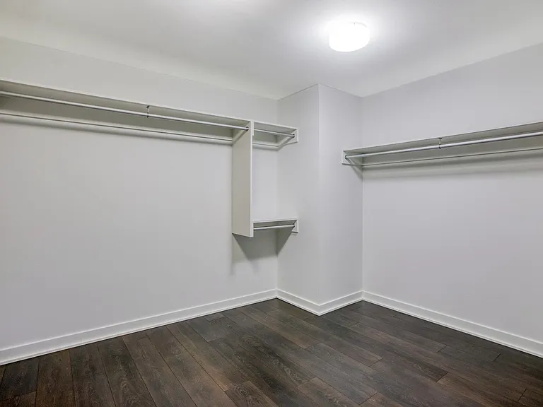 Oversized walk-in closets with built in shelving