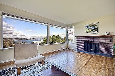 Spacious living room with gleaming hardwood floors