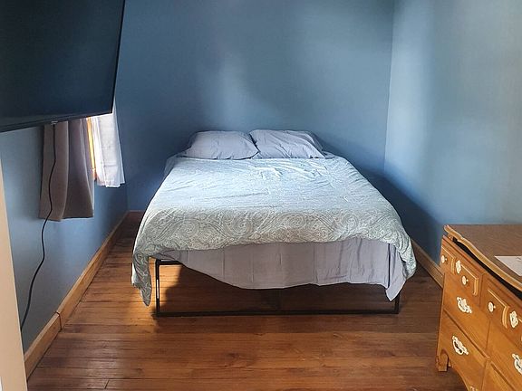 Master bedroom with french doors to porch.