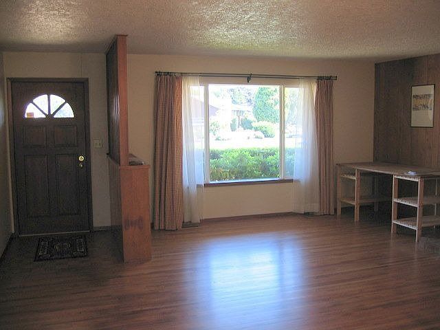 Lovely hardwood floors in living room, dining room and hallway.