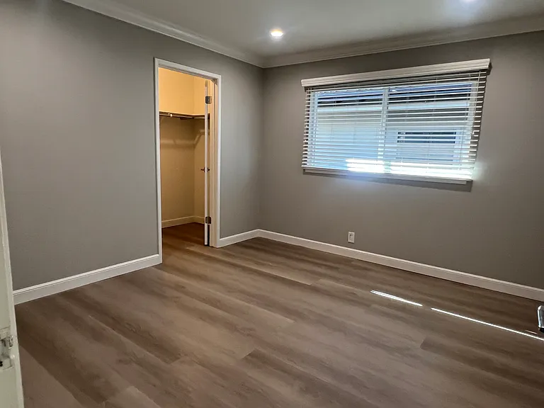 Bedroom with walk in closet
