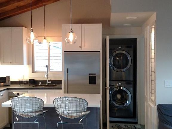 Back door leads to Laundry Room (L.G. stacked washer/dryer)