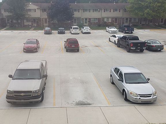 Parking area in front of condo