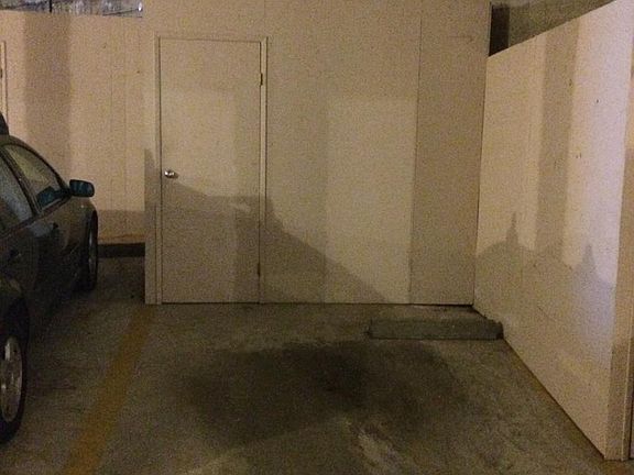 Parking with storage locker