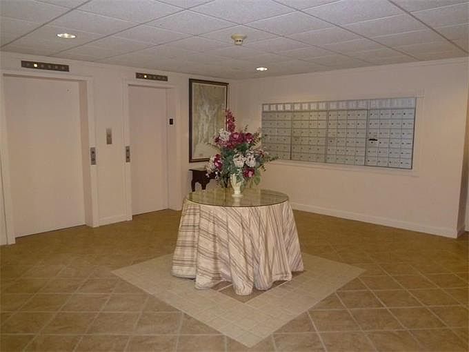 Foyer, mailboxes and elevators.