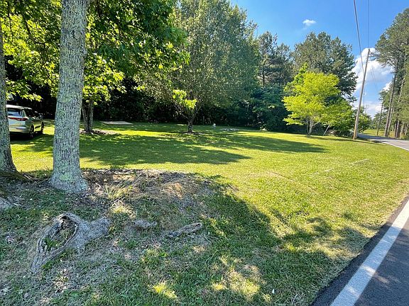 large side yard with fire pit