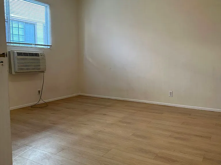 Bedroom 1 with new wood floor