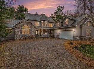 410 S Golden Beach Dr, Kewadin, MI 49648