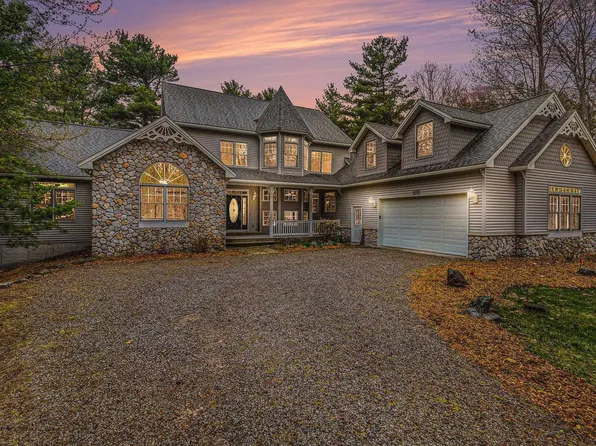 410 S Golden Beach Dr, Kewadin, MI 49648