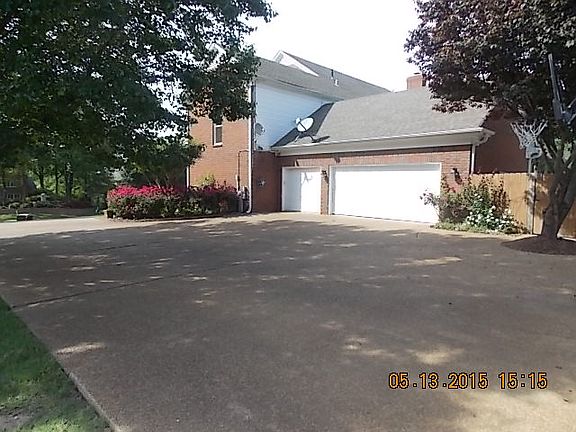 large driveway 3 car garage