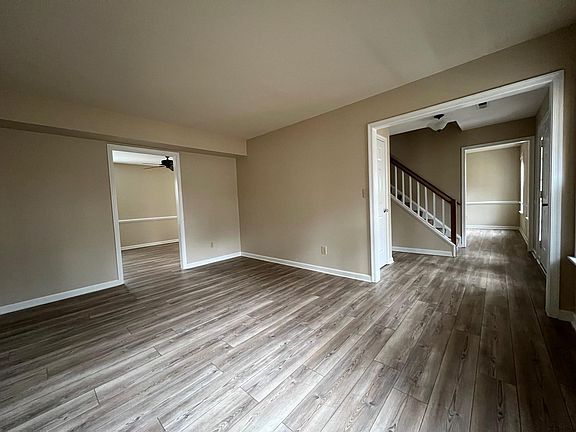 Opening hallway flows into Living Room (15' x 11').