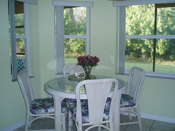 Bright breakfast area overlooks nature view