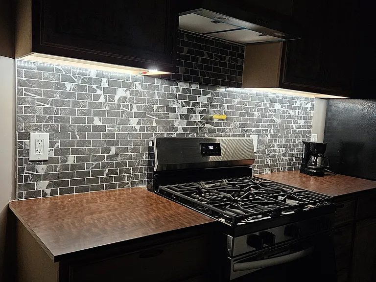 Cabinet lights for nice late night walk for a snack.