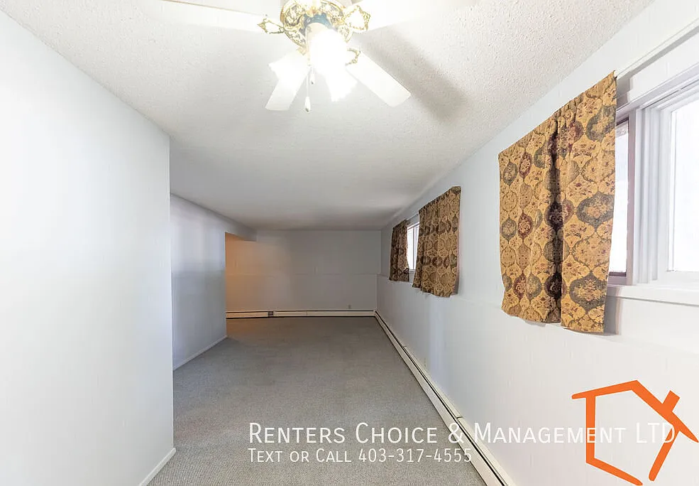 2 Bedroom With Assigned Parking, Onsite Laundry — Photo 2