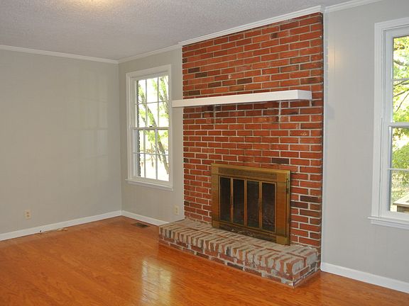 DEN W/ FIREPLACE & HARDWOOD