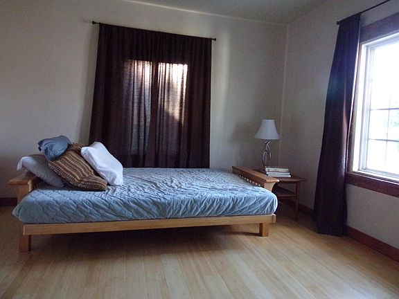 Master Bedroom, bamboo flooring , large windows