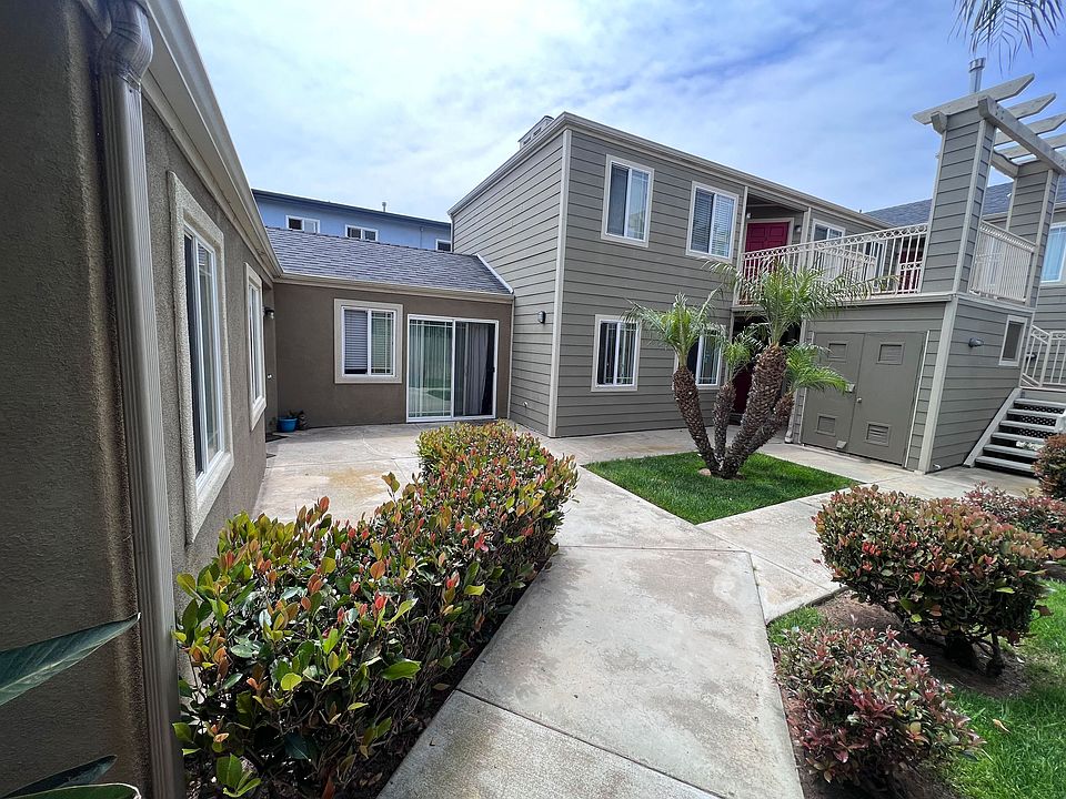 Walkway to courtyard at Dubuque Apartments in Oceanside, CA.
