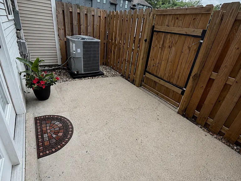 Additional view of your private porch with door exiting to private parking lot.