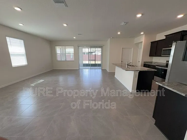 4122 NW 48th Terrace Rd — Photo 16