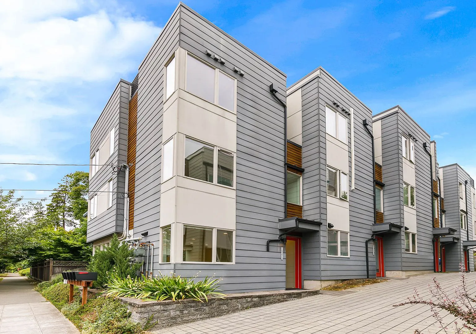 3 Bedroom Modern Industrial Townhome with City Views & Rooftop Oasis — Photo 3