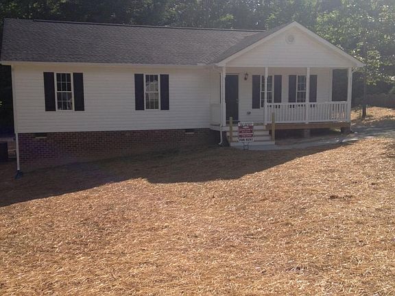 Large Front and Rear Yard with Gravedl Driveway on a Private