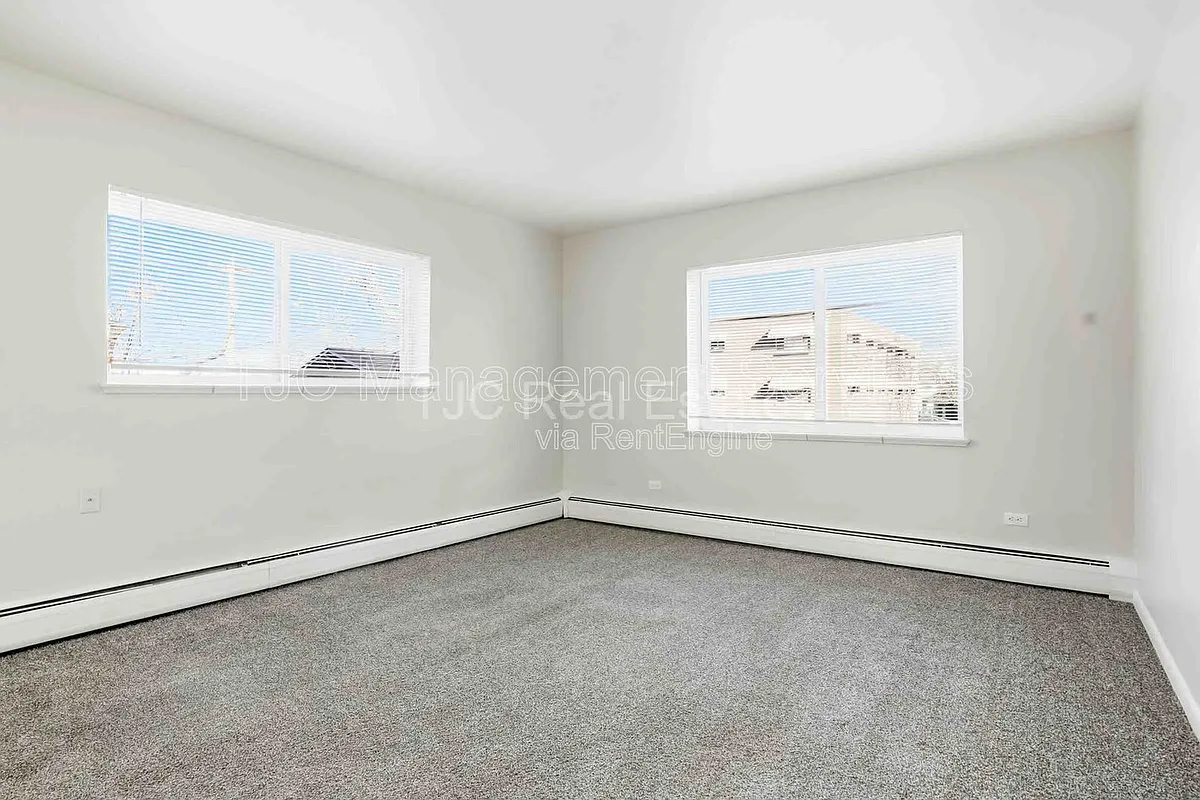 Building Photo - 42 N Pearl St #204