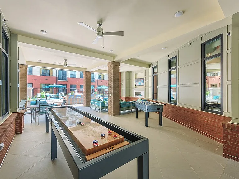 Game Room With Shuffle Board