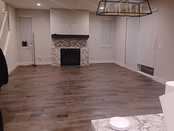1st floor,1 bathroom, 1 bed, kitchen, living room, laundry, 2 garage doors. nice paver backyard.