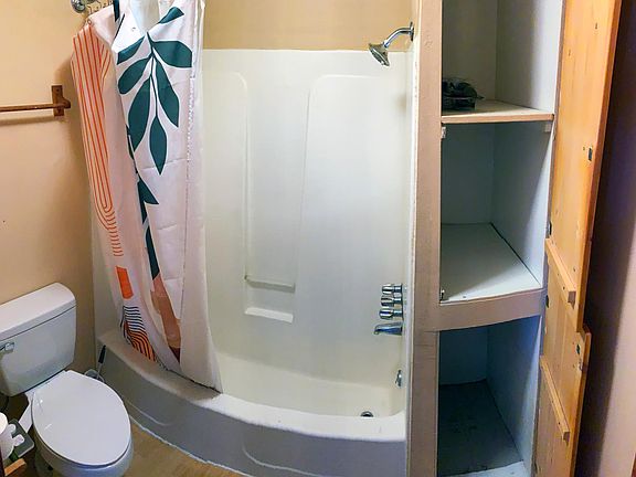 Shower/toilet /linen closet