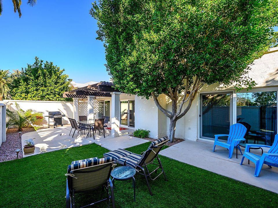 Large Back Patio with grill and lounging area