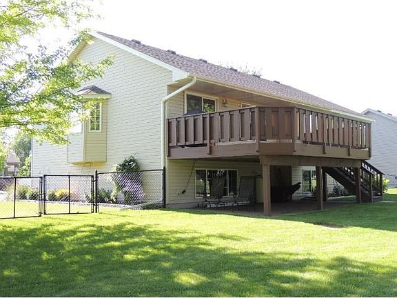 Extra large deck off back of home receives shade in late afternoon and evening