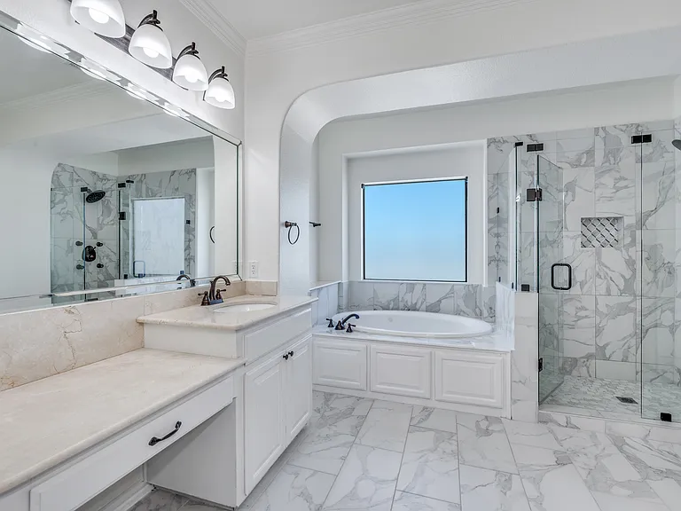 Renovated primary bath with separate bathtub & shower