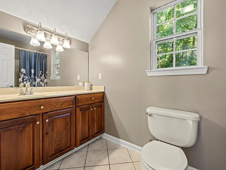 En suite primary bathroom upstairs