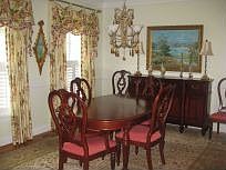 Formal dining off open foyer