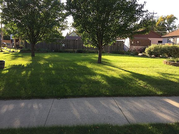 Includes lot next door 