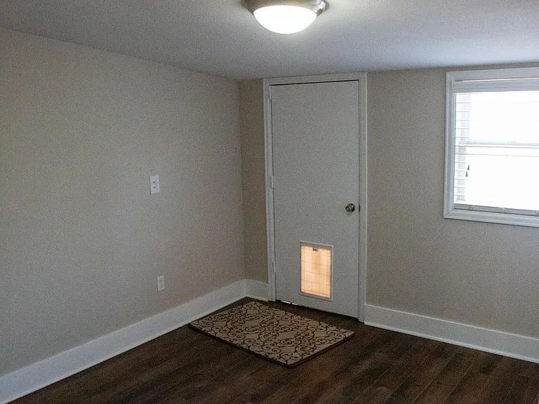 Master bedroom with door to backyard
