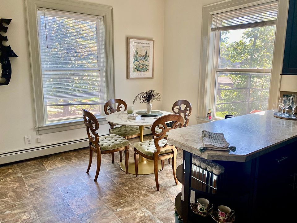 Enjoy dining in this bright eat-in kitchen.