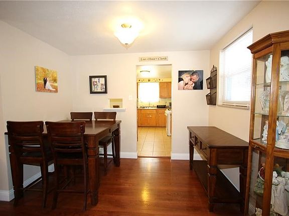 Beautiful Re-Finished (2011) Original Hardwood Floors in Separate 11x10 Dining Room w/ Plaster Walls & Wood Baseboard Trim