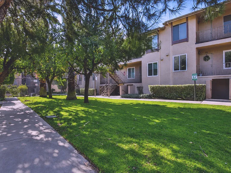 Grassy lawn in front of unit.