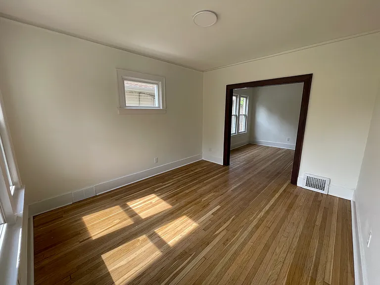 living room with view into dining room