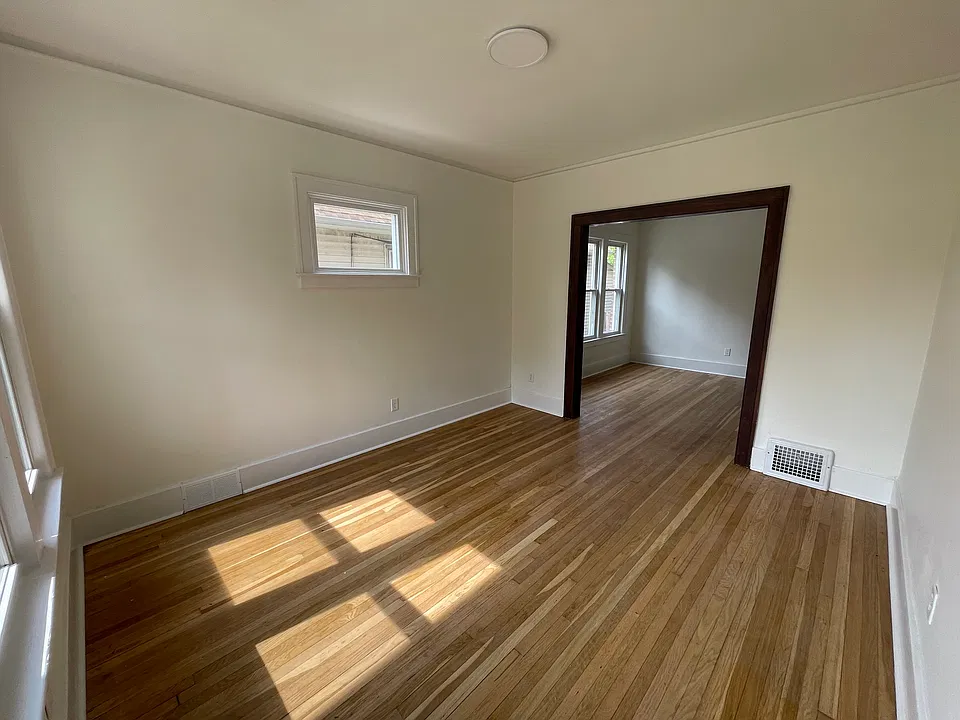 living room with view into dining room