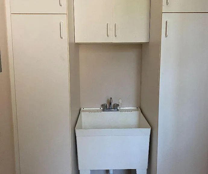 laundry room sink and closets