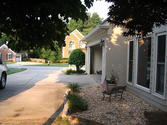 View of side entry level drive/garage