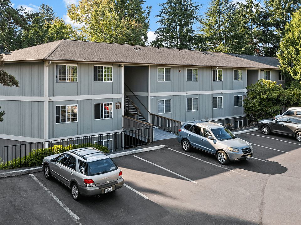 Well-maintained apartment building with resident parking