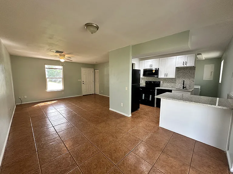 Kitchen, living room, and dining area